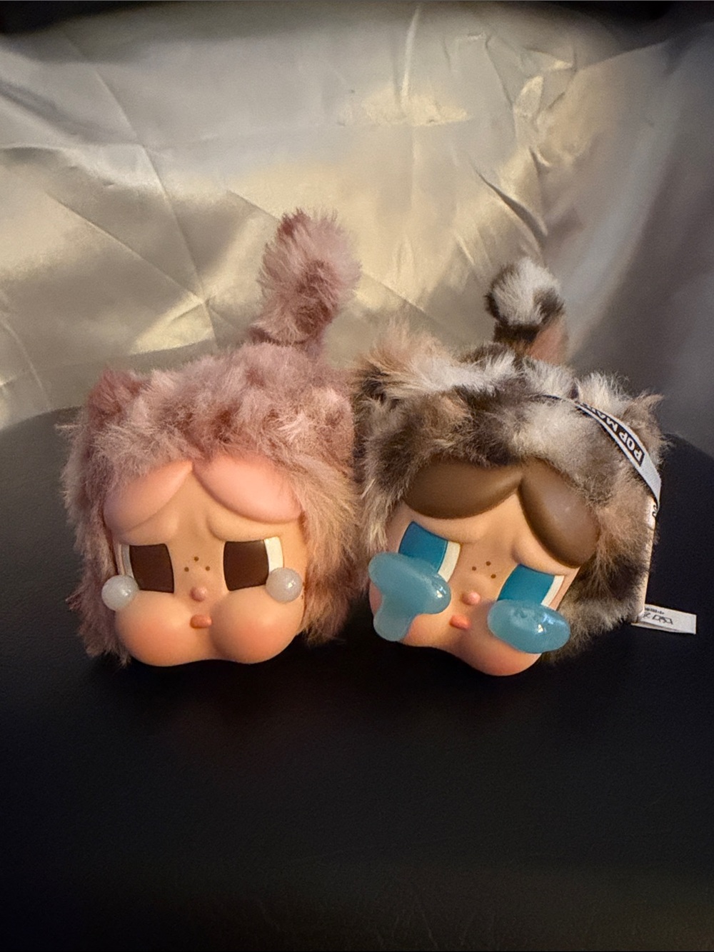 This is 2 of the cry baby line from POP MART and they are magnetic on the bottom